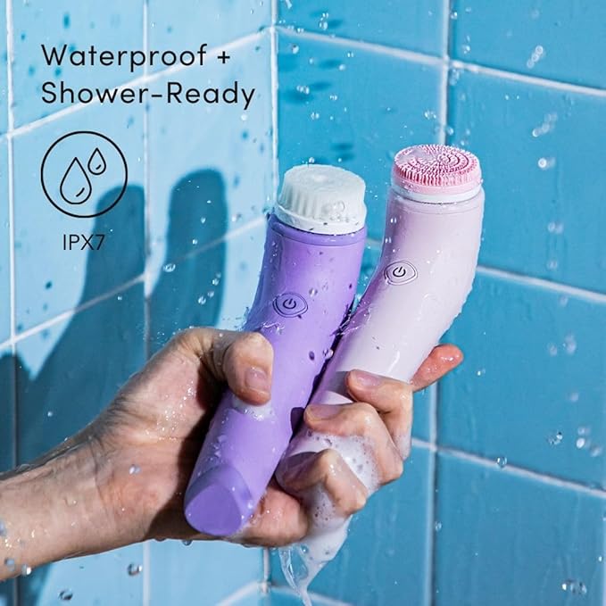 Fancii Facial Cleansing Brush with Self Cleaning Station, Rechargeable & Waterproof - Electric Face Scrubber for Gentle Exfoliation and Deep Scrubbing - 2 Exfoliating Brush Heads, Skylar (Purple)